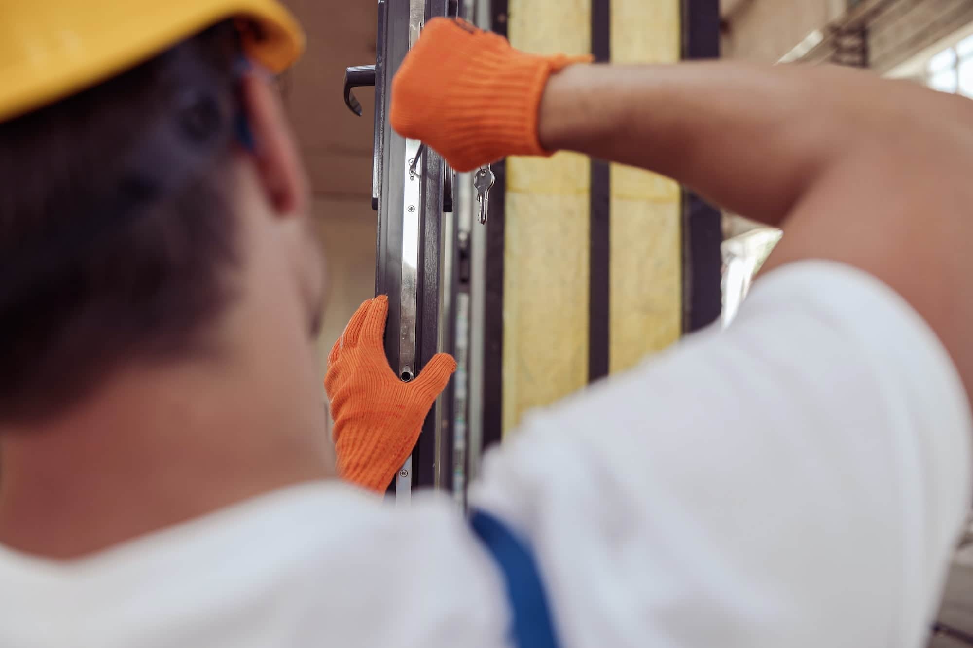 Garage door installation at a construction site
