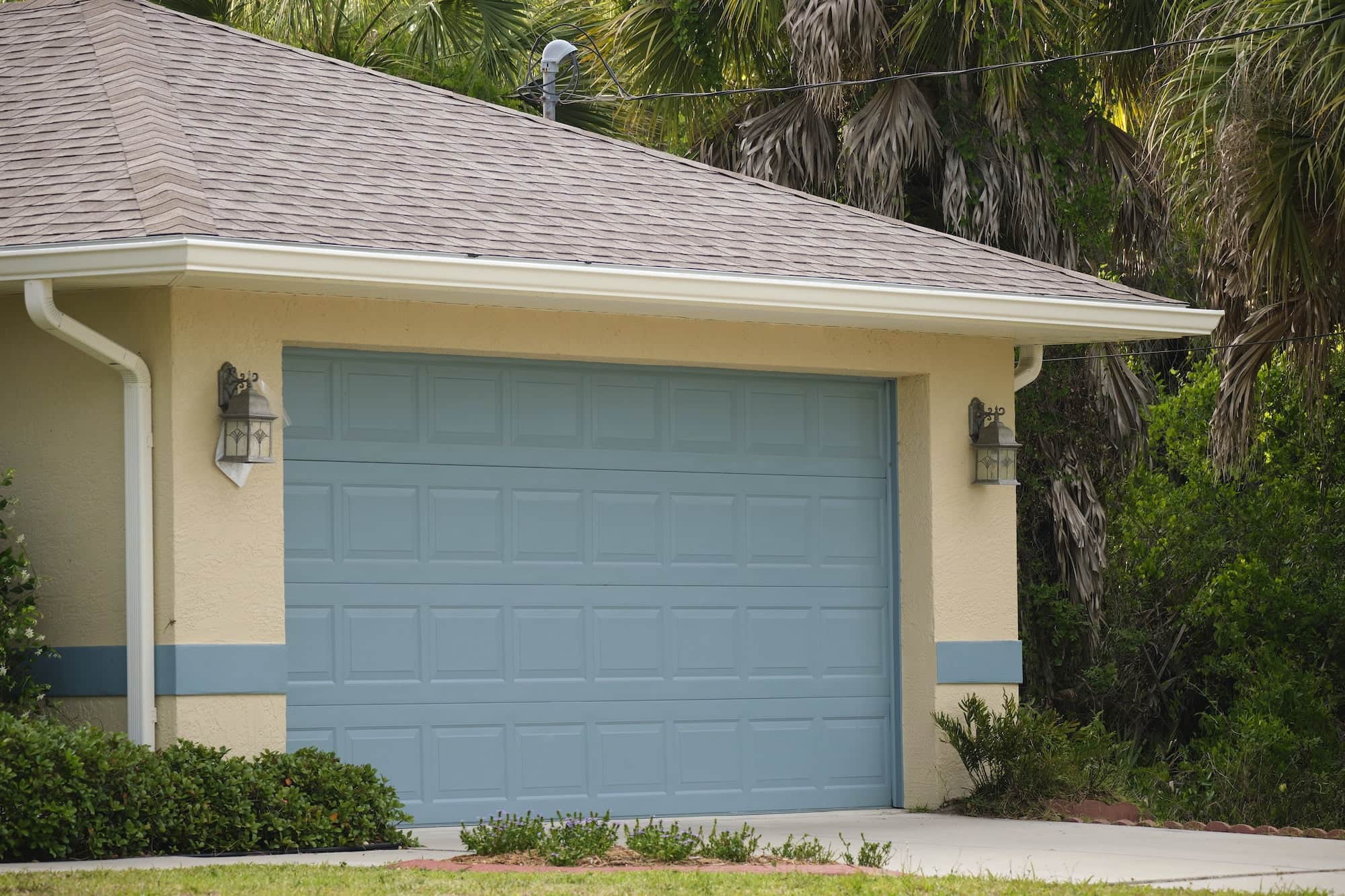 Modern residential double garage door in San Antonio